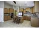 Modern kitchen with granite counters, stainless appliances, central island, and light wood cabinetry at 786 W Jahns Dr, Casa Grande, AZ 85122