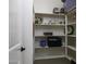 Spacious walk-in pantry with multiple shelves for ample storage, keeping your kitchen organized at 786 W Jahns Dr, Casa Grande, AZ 85122