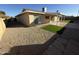 Large backyard with artificial turf and gravel landscaping at 2429 E Alameda Dr, Tempe, AZ 85282