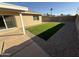 Artificial turf and gravel backyard with patio at 2429 E Alameda Dr, Tempe, AZ 85282
