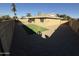 Home with a large backyard, artificial turf, and gravel at 2429 E Alameda Dr, Tempe, AZ 85282