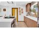 Bright kitchen with stainless steel appliances, white countertops, and retro-style wall decor at 4644 N 74Th Pl, Scottsdale, AZ 85251