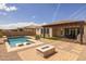 Outdoor pool with a view of the patio, grass, and backyard at 10331 E Wavelength Ave, Mesa, AZ 85212