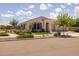 Attractive home showcasing tidy landscaping, colorful window trim, and a neutral color palette at 10331 E Wavelength Ave, Mesa, AZ 85212