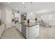 Stylish kitchen showcasing a large island, modern appliances, and lots of natural light at 10331 E Wavelength Ave, Mesa, AZ 85212