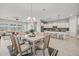 Open concept living area showcasing the kitchen and living area filled with natural light at 10331 E Wavelength Ave, Mesa, AZ 85212