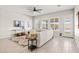 Cozy living room boasting ample natural light, tile floors, and comfortable seating arrangements at 10331 E Wavelength Ave, Mesa, AZ 85212