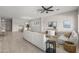 Spacious living area with comfortable seating, contemporary decor, and an open floor plan at 10331 E Wavelength Ave, Mesa, AZ 85212