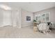 Spacious living area with tile floors and bright windows featuring shutters at 10331 E Wavelength Ave, Mesa, AZ 85212