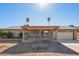 Ranch style home with carport and landscaped yard at 3849 E Sheena Dr, Phoenix, AZ 85032