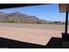 Expansive backyard featuring desert landscaping and stunning mountain views at 3909 S Veronica Ln, Gold Canyon, AZ 85118
