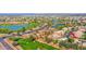 Scenic aerial view of golf course community, showcasing green spaces and water features at 760 N Ithica St, Gilbert, AZ 85233