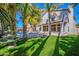A lush backyard featuring a view of the pool, fountain, patio and house at 760 N Ithica St, Gilbert, AZ 85233