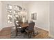 Formal dining room featuring a chandelier and large windows providing natural light at 760 N Ithica St, Gilbert, AZ 85233