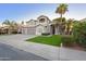 Charming two-story home with a three car garage, desert landscaping, and a tile roof at 760 N Ithica St, Gilbert, AZ 85233