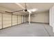 Spacious garage with multiple doors, epoxy flooring, and built-in storage at 760 N Ithica St, Gilbert, AZ 85233