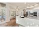 Modern kitchen featuring quartz counters, white cabinets, and stainless steel appliances at 760 N Ithica St, Gilbert, AZ 85233