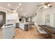 Open-concept kitchen flowing into a living area with a view, creating an inviting and airy space at 760 N Ithica St, Gilbert, AZ 85233