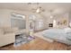 Spacious main bedroom featuring hardwood floors, fireplace, and sitting area at 760 N Ithica St, Gilbert, AZ 85233