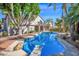 A backyard view of the pool, patio, balcony and second story of the home at 760 N Ithica St, Gilbert, AZ 85233