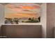 View of neighboring homes with lovely sunset sky from a private balcony at 760 N Ithica St, Gilbert, AZ 85233