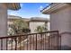 Balcony with views of the tile roof and outdoor stairs at 10030 W Indian School Rd # 218, Phoenix, AZ 85037