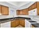 Efficient kitchen space featuring modern appliances, ample counter space, and functional design at 10030 W Indian School Rd # 218, Phoenix, AZ 85037