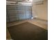 View of the gray paneled garage door from inside the garage, showing functional design at 10477 W Highwood Ln, Sun City, AZ 85373