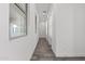 Hallway with natural light and wood-style flooring at 11691 N Luckenbach St, Surprise, AZ 85388