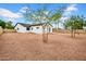 Large backyard with desert landscaping and modern one-story home at 2126 E Watson Dr, Tempe, AZ 85283