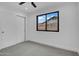 Bright bedroom with sliding door closet and natural light from single hung window at 2126 E Watson Dr, Tempe, AZ 85283