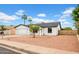 Attractive single-Gathering home with desert landscaping, palm trees, and a welcoming front yard at 2126 E Watson Dr, Tempe, AZ 85283
