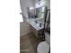 Modern bathroom with floating vanity, sleek fixtures, and stylish design at 4442 E Aire Libre Ave, Phoenix, AZ 85032