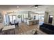 Expansive open-concept living space features a modern kitchen and connected living spaces at 4442 E Aire Libre Ave, Phoenix, AZ 85032