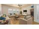 Bright living room with fireplace and hardwood floors at 21320 N 56Th St # 2159, Phoenix, AZ 85054