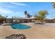 A spacious backyard pool with a lounge area is perfect for entertaining and relaxing at 2246 W Mulberry Dr, Phoenix, AZ 85015