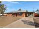 Charming single-story brick home with a well-maintained front yard and long driveway at 2246 W Mulberry Dr, Phoenix, AZ 85015