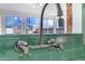 A close-up of kitchen with green tile and vintage-inspired faucet and fixture at 2246 W Mulberry Dr, Phoenix, AZ 85015