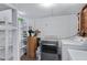 Functional laundry room with modern appliances and ample storage solutions at 2246 W Mulberry Dr, Phoenix, AZ 85015