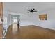 Bright living room with a ceiling fan and a view of the kitchen at 2246 W Mulberry Dr, Phoenix, AZ 85015