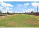 Spacious, fenced dog park with grassy area for pets at 5725 S 101St St, Mesa, AZ 85212
