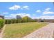 Well-maintained backyard with manicured green grass and a grill at 28389 N 131St Dr, Peoria, AZ 85383