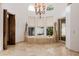 Luxurious bathroom with a large tub, tile surround, and plenty of natural light at 6620 E Stallion Rd, Paradise Valley, AZ 85253