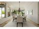 Elegant dining room featuring tray ceilings, abundant natural light, and seating for eight for gatherings at 6620 E Stallion Rd, Paradise Valley, AZ 85253