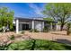 Modern home exterior with desert landscaping, creating an inviting and low-maintenance outdoor space at 6620 E Stallion Rd, Paradise Valley, AZ 85253