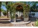Enchanting garden gazebo surrounded by climbing vines and lush greenery, creating a serene outdoor space at 6620 E Stallion Rd, Paradise Valley, AZ 85253