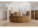 Gourmet kitchen with large island, custom cabinets, and stainless steel appliances at 6620 E Stallion Rd, Paradise Valley, AZ 85253