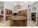 Gourmet kitchen with large island, custom cabinets, and stainless steel appliances at 6620 E Stallion Rd, Paradise Valley, AZ 85253