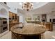 Gourmet kitchen featuring a large island, custom cabinets, and stainless steel appliances at 6620 E Stallion Rd, Paradise Valley, AZ 85253