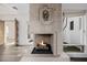 Close up of living room fireplace featuring a stone surround and lion sculpture at 6620 E Stallion Rd, Paradise Valley, AZ 85253